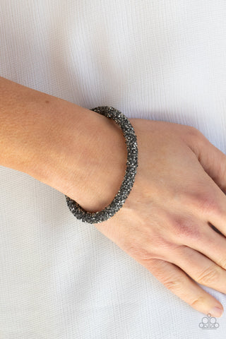 Roll Out The Glitz - Black - Hematite and Smoky Rhinestone Paparazzi Coil Bracelet - Black Diamond Exclusive