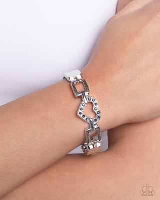 Flashy Fondness - Blue - Rhinestone Encrusted Heart Paparazzi Hinge Bracelet