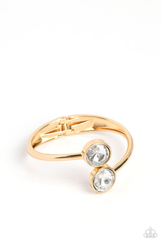 Daily Dazzle - Gold - Oversized White Gem Paparazzi Hinge Bracelet