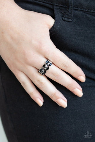 Distractingly Demure Black Paparazzi Ring