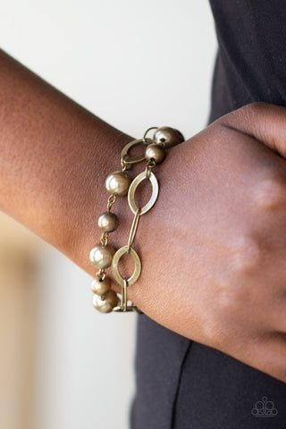 Winner Glimmer Brass Paparazzi Bracelet