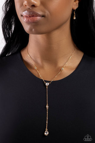 Lavish Lariat - Gold - White Round, Teardrop, Heart Rhinestone Y-Shaped Paparazzi Short Necklace