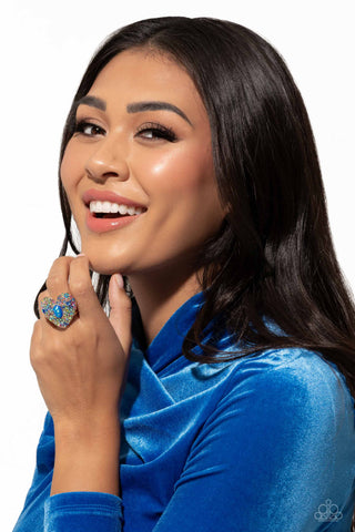 Bejeweled Beau - Blue - and Iridescent Rhinestone Heart Paparazzi Ring - November 2023 Life of the Party Exclusive