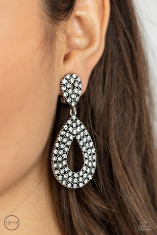 Pack in the Pizzazz White Paparazzi Clip-On Earrings